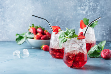 Wall Mural - Red cocktail with ice and fresh strawberry