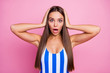 © deagreez - Photo of pretty shocked lady long straight hairstyle smooth bronze body skin not believe eyes epic fail arms on head wear white blue striped bodysuit isolated pastel pink color background