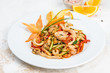 © sapunovaphoto - Seafood and vegetables salad served in a white plate