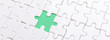 © lizaelesina - White jigsaw puzzle with with one piece missing and green background