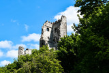 Fototapeta  - The mountain ruin of the 321 meter high Drachenfels with a beautiful blue sky