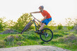 © mihakonceptcorn - Extreme cycling concept, cyclist jumping on a mountain bike.