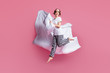 Full length photo of funny lady jump high hold pillow blanket flight slumber party girls night wear sleep mask white t-shirt plaid pajama trousers barefoot isolated pink color background