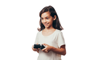 Child girl playing video game isolated on white background