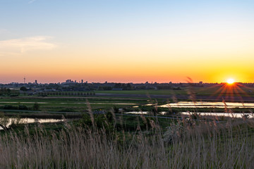 The setting sun over The Hague, seen from the hills in the Buytenpark in Zoetermeer 2