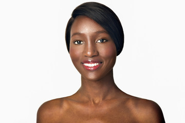 Beautiful  African-American woman. Black Beauty. Beautiful face of young adult woman with clean fresh skin.