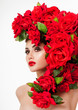 © Svetlana Fedoseeva - Beautiful woman face surrounded by red roses. Perfect skin. Professional makeup.