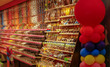 Various sweets and snacks on the shelves. Interior of a sweet shop