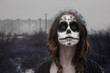 Girl with sugar skull makeup. Idea for a Halloween photo shoot
