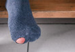 Male sock with a hole