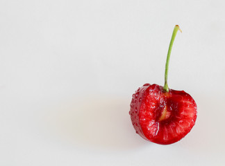 red cherries on a white background