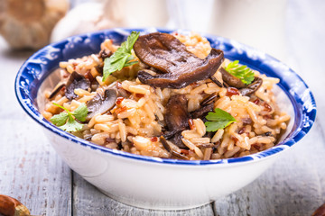 Wall Mural - Risotto with mushrooms ande vegetables