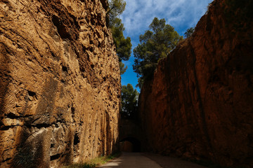 Wall Mural - View of the rock from under the cave. Sandy yellow rock.  Rocks. 