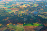 Fototapeta Krajobraz - Aerial view background of Poland forests and hills in morning sunrise time. Autumn, Europe.
