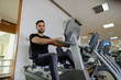 © Ranta Images - Full body shot of young bearded Indian man doing cardio exercises at the gym