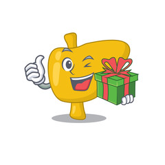 Wall Mural - joyful liver cartoon character with a big gift box