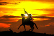 Cowboy Statue bei Sonnenuntergang