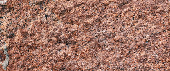 Wall Mural - Background granite is a red stone with small black and white spots on the entire surface.