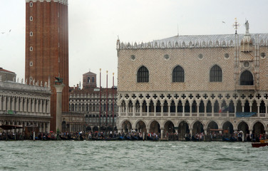 Wall Mural - Cityscape with St. Mark's square with campanile, Doge's palace, historical facades in Venice. View from the adriatic sea