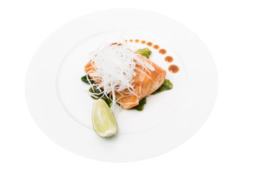 Sticker - Steak of grilled salmon under grated daikon.