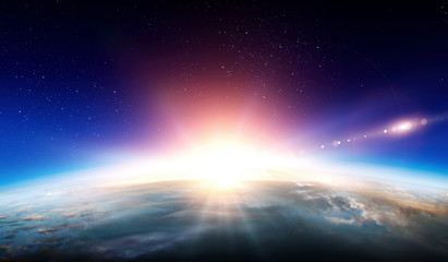 earth with sunrise on blue space background