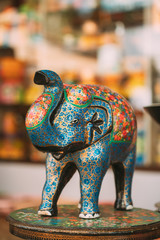 Wall Mural - Goa, India. Painted Elephant Souvenir Of Porcelain On Shelf In Store. Goods For Tourists