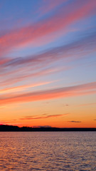 Canvas Print -  lake at sunset with clouds. vertical frame