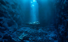 Underwater Photo Of Magic Sunlight Inside A Cave