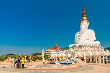 Amazing Thailand Temple with big Buddha statue on background scenery nature landscape at sunrise. Beautiful Landmark of Asia, Asian culture and religion.