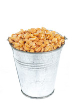 Full Bucket Of Dry Peas Grains On A White Background.