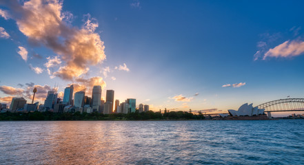 Fototapete - Sydney downtown skyline during sunset with Sydney harbor bridge, NSW, Australia