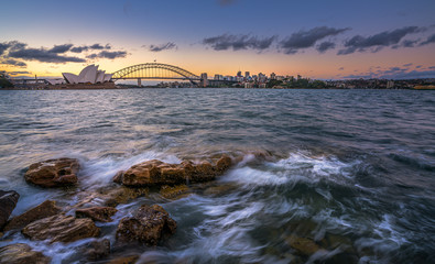 Fototapete - Sydney harbor skyline at sunset with Sydney harbor bridge, NSW, Australia