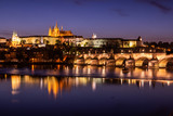 Fototapeta Miasto - Charles bridge and the Prague castle in the evening, Czechia