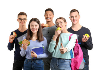 Canvas Print - Pupils having snack on white background