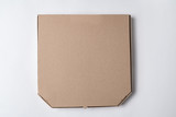 Fototapeta Lawenda - Cardboard pizza box on white background. Mockup, place for text.