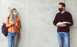 © Kzenon - Two students standing in social distance wearing face mask