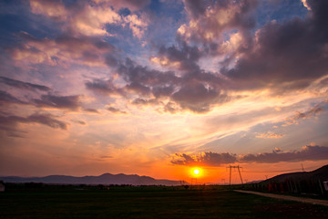 Wall Mural - Solar disk at the sunset