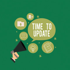 Wall Mural - conceptual hand writing showing time to update. concept meaning this is right moment to make somethi