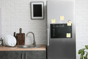 Sticker - Chalkboard on door of refrigerator in kitchen