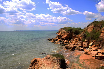 Beautiful wild Beach Fontanka  near Odessa. Yellow and red sandstone cliffs are located on the seafront. Sunny day