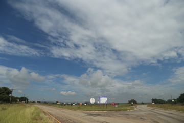 rural landscape with road and blue sky