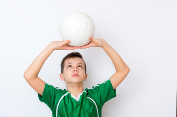 Kid play with volleyball over white background. Kid activities.Training game concept.