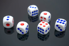Close-up Of Dices On Glass Table
