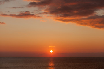 Wall Mural - Beautifull sky with clouds and sun at sunset. Sky background