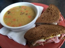 Close-up Of Meat Sandwich And Bacon Lentil Soup In Plate