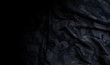 © memorystockphoto - black camouflage military background