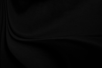 Wall Mural - closeup abstract black cloth satin and silk fabric background.