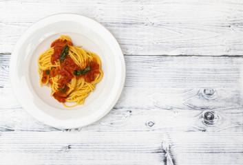 Wall Mural - still life with spaghetti with tomato sauce and basil