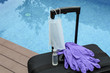 © Natalia - Travel suitcase, sanitizer gel or antibacterial soap, disposable gloves and medical mask. The ban on travel during the epidemic of the coronavirus and the introduction of quarantine concept.