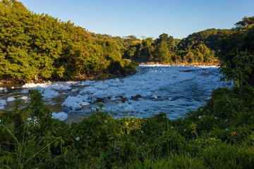 polluted Tiete river on the park road, environmental preservation area, Itu, Sao Paulo, Brazil